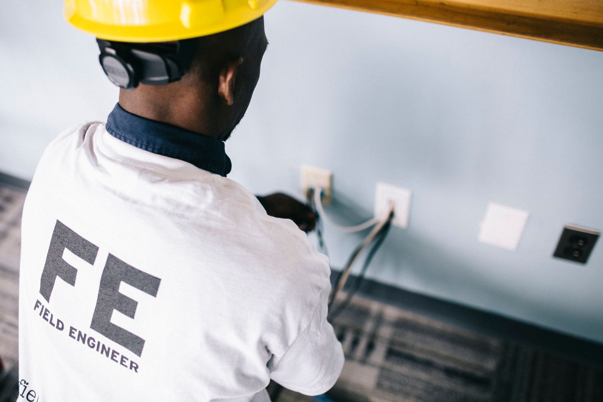 Electrician repairing power sockets